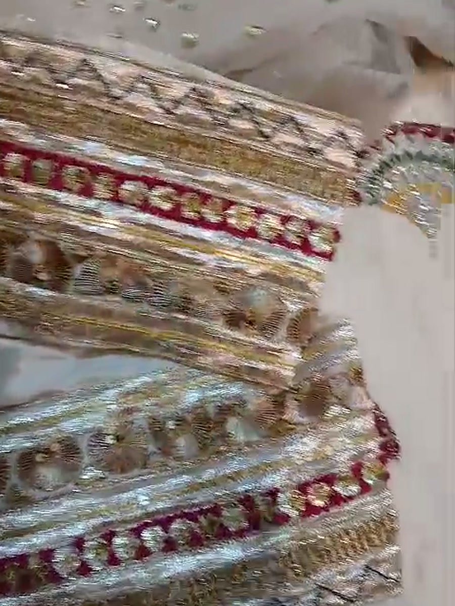 Gota borders and the sequinned dupatta of the ivory outfit