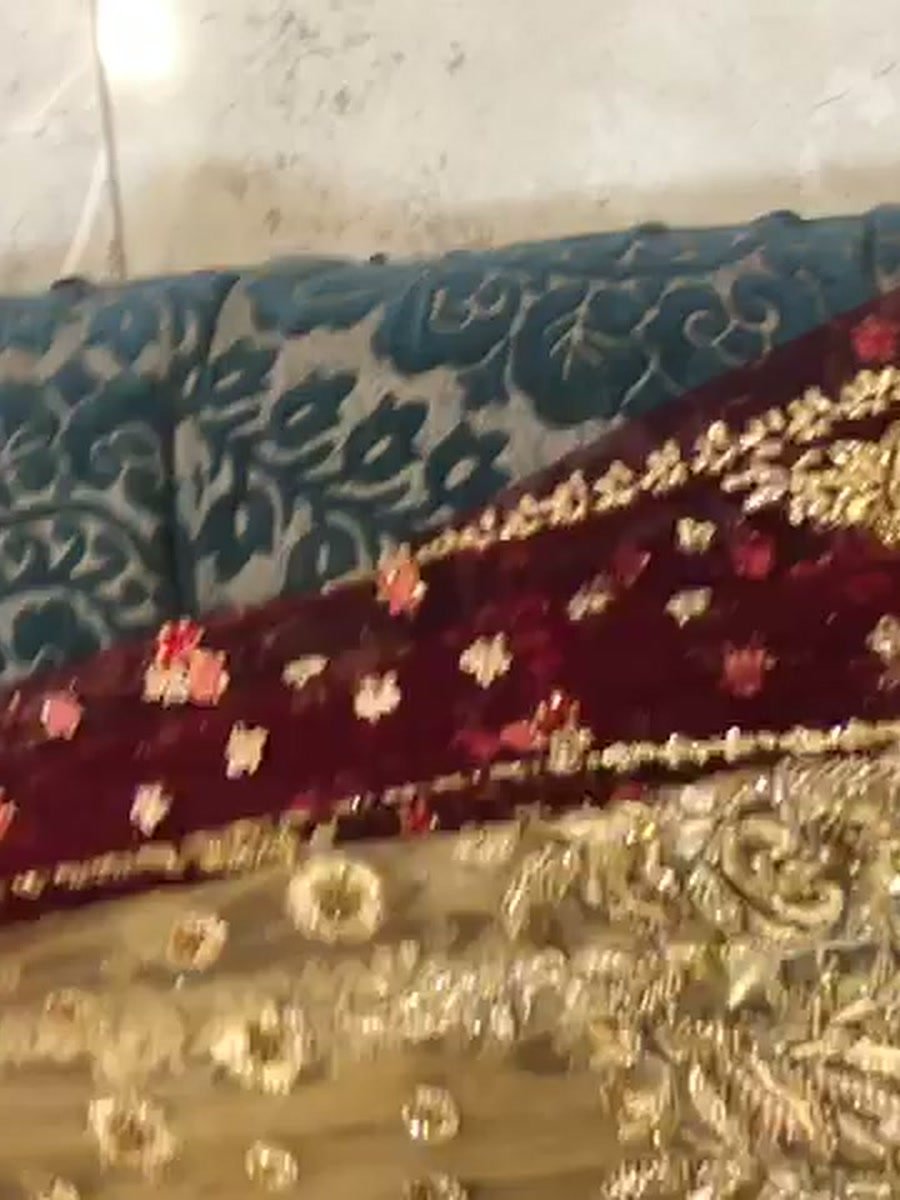 Maroon velvet over gold tissue with heavy embroidery